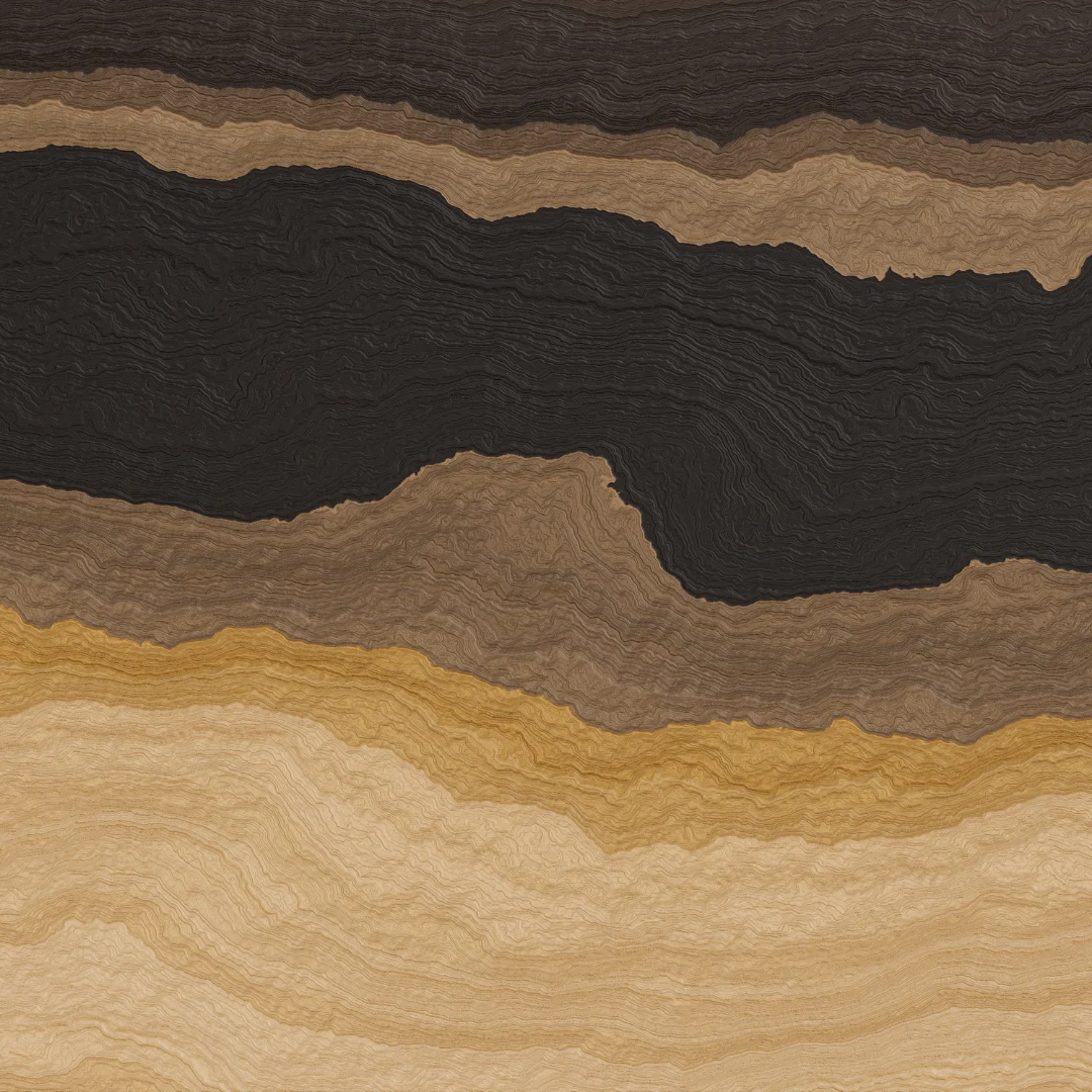 Stratified soil layers showing distinct dark brown, medium brown, ochre, and tan geological strata.