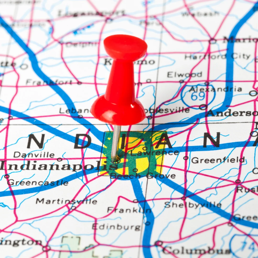 Red pushpin marking Indianapolis on a map of Indiana.